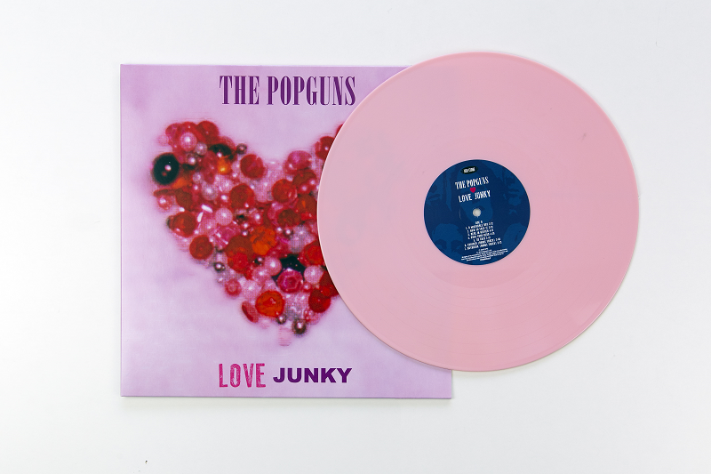 The Popguns "Love Junky" pink coloured vinyl. Manufactured by Key Production.